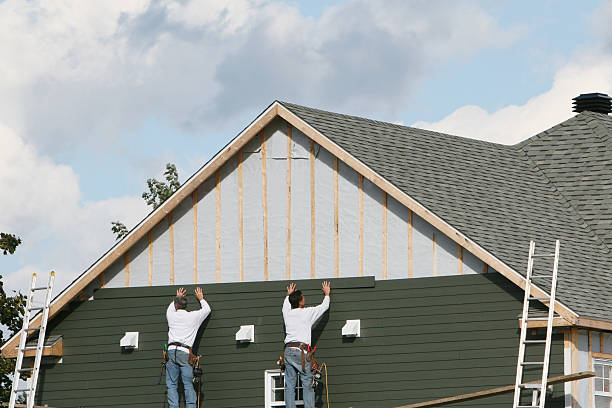Professional Siding Installation technician working in Winthrop, MA